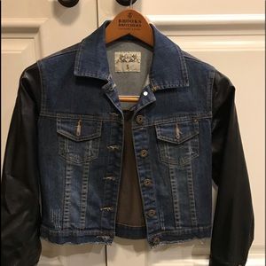 Jean jacket with leather sleeves